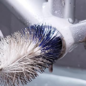 Cleaning and washing the bicycle frame threads at the bottom bracket