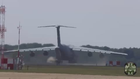 One of the crew members of this Lockheed C-5M Super Galaxy, while taxiing, opened the hatch