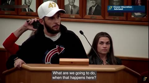 Activists strip to protest trans athletes at Maine school board
