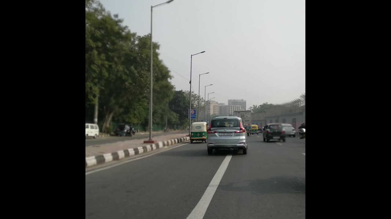 Cruising through the vibrant streets of RK Puram, South Delhi 🏍️🌆