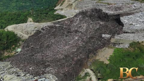 Mound of garbage collapses at Philippine landfill, burying and trapping 38 people