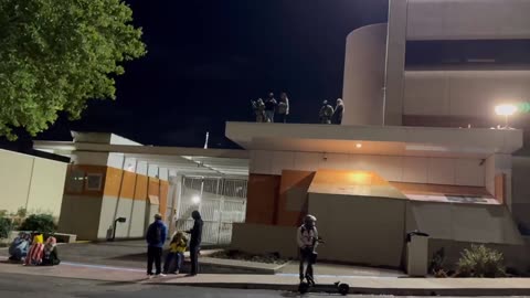 PATRIOTS have shown up outside the Portland ICE facility, holding up a sign saying