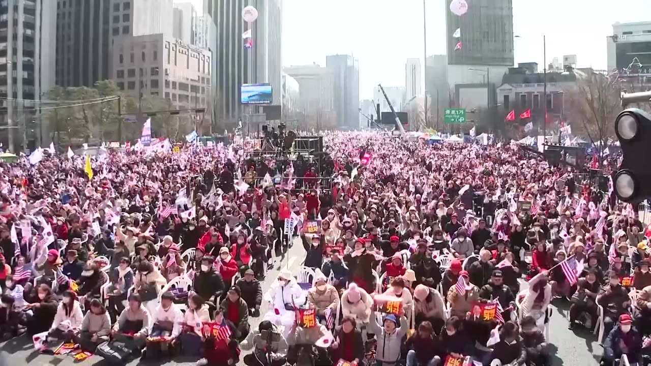 South Korea's President Yoon walks free, but trials continue