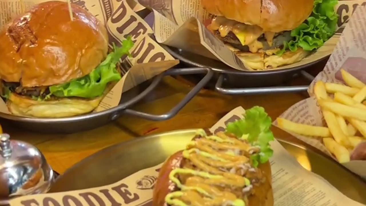 The burger made the child's mouth water instantly!"