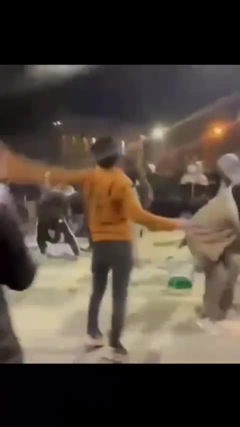 Protesters tore open bags of rice