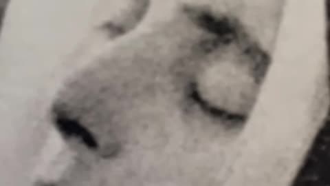 Waxed mask on the incorrupt body of St Bernadette Soubirous
