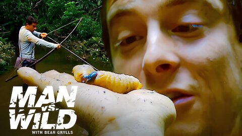 Bear Grylls Eats the Biggest Grubs He's Ever Seen | Man vs. Wild