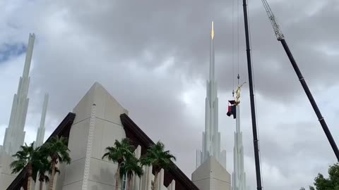 Las Vegas Nevada temple statue being affixed back in place