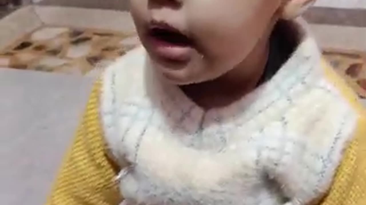 A small child says, there were big monkeys, I tore my clothes