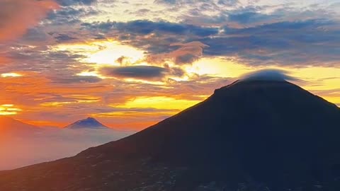 The beauty of sunrise on Mount Sindoro from Indonesia
