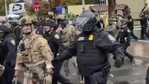 WATCH: Protesters clash with law enforcement outside an ICE building in Portland on Saturday.