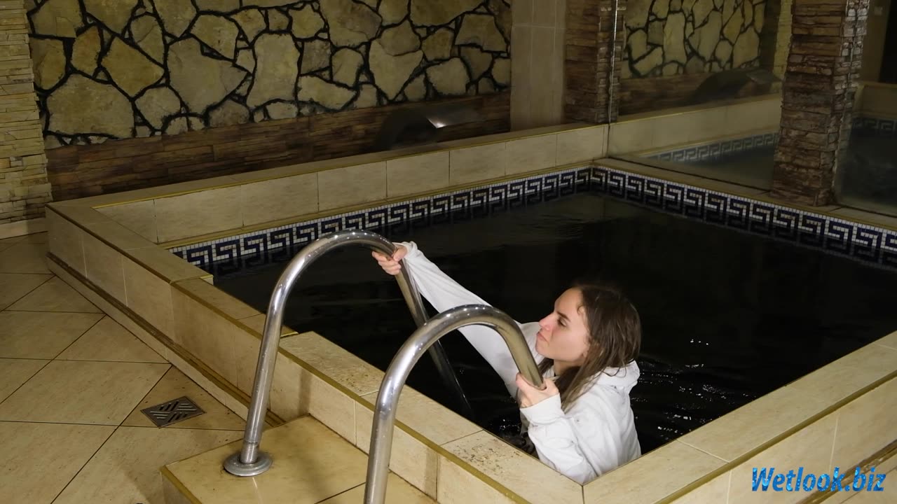 Wetlook girl in pink Jeans