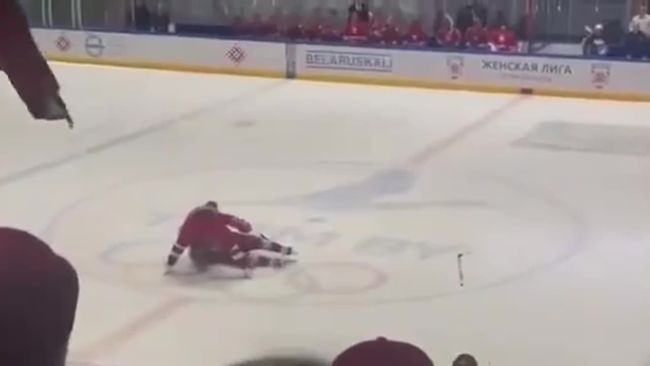 Lukashenko Hits the Deck During Hockey Game