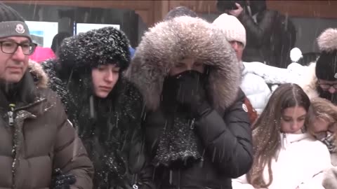 Church bells ring across Switzerland, as nation mourns fire victims