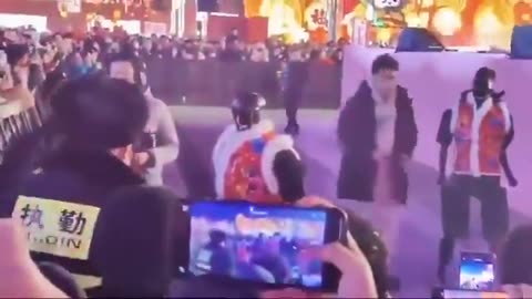 AI robot attacks crowd in China.