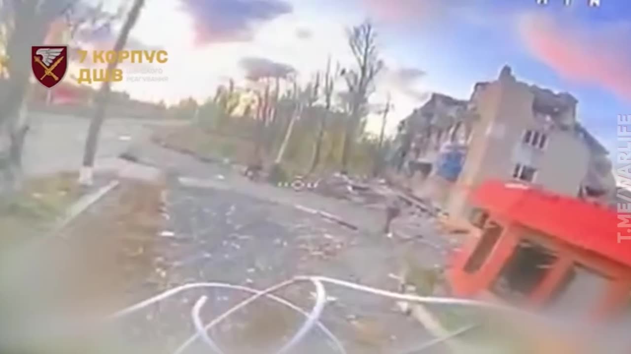Drone Slams into a Group of Russian Soldiers Taking Victory Photos in Central Pokrovsk