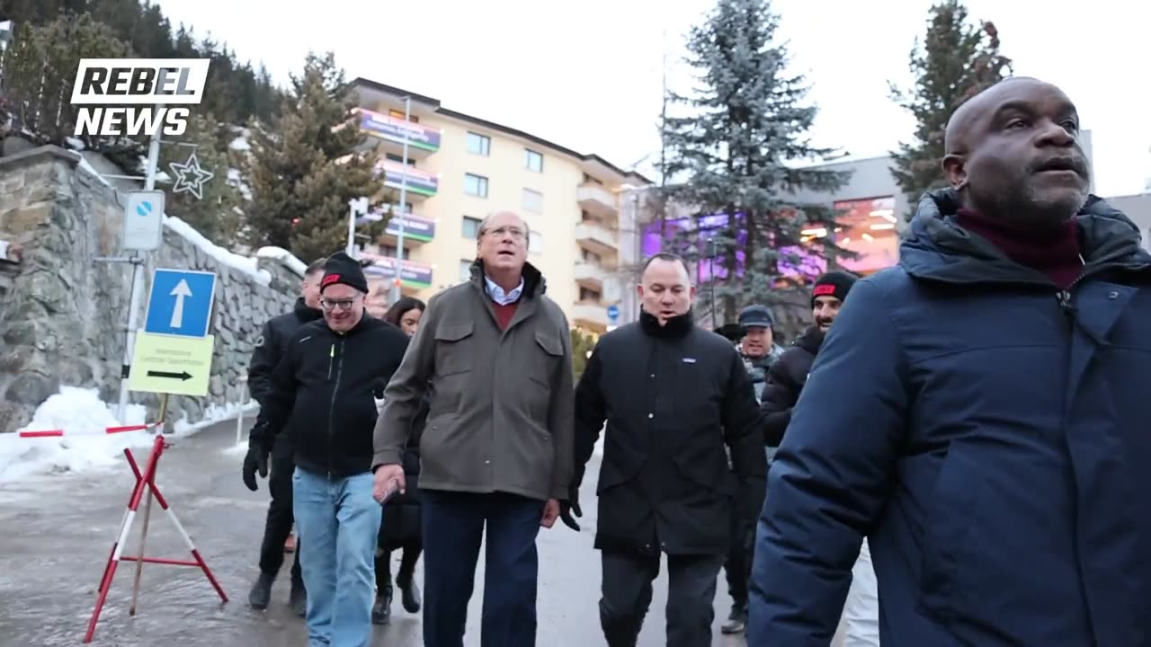 Black Rock CEO & International Criminal, Larry Fink, CAUGHT by Rebel News at Fraudulent WEF Event