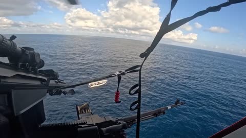 Watch a Coast Guard helicopter sniper disable a go-fast drug vessel in interdiction op