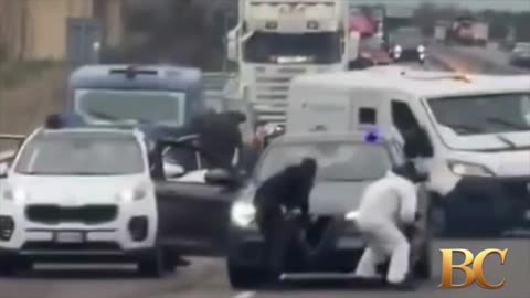 Gunmen block highway, blow up armored cash truck in Italy