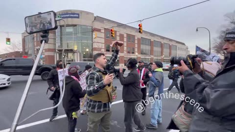 Jake Lang slapped bacon all over the Islamic Quran right in front of them.