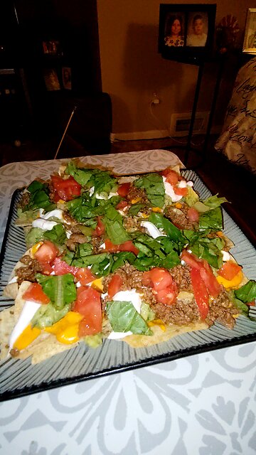 Eating Nachos Prepared By Wife, Dbn, MI, 11/26/25
