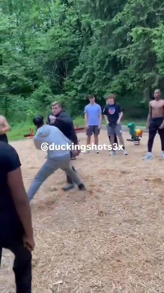 negro and white guy throw hands and the predictable happens .....