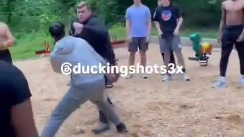 negro and white guy throw hands and the predictable happens .....