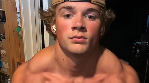 Teen bodybuilder flexing muscles