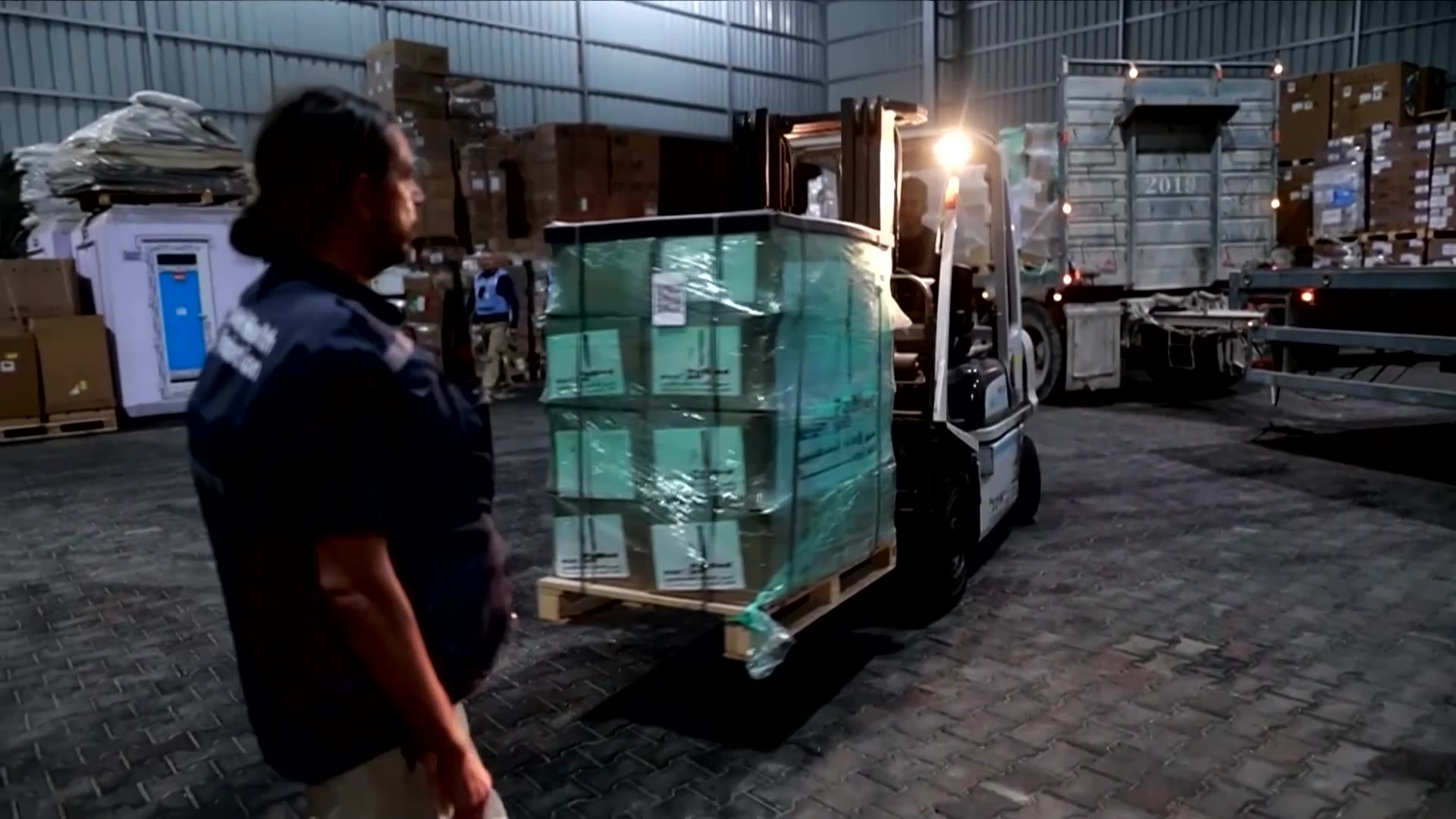 World Health Organization transports aid supplies into Gaza