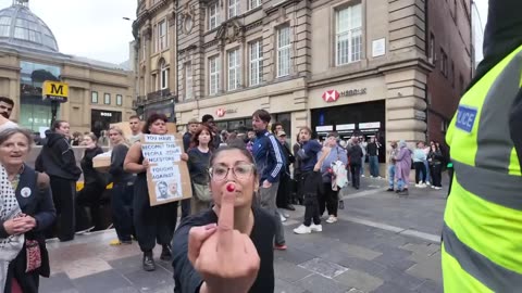 The peaceful, aggressive and abusive Anti Fascists intimidating a young boy