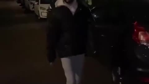A man is apparently following a drunk woman home & is challenged by a local.