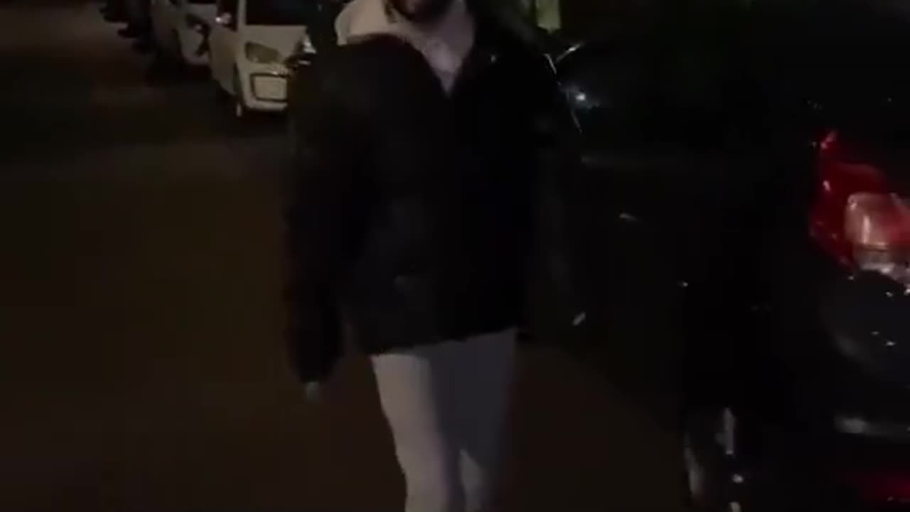 A man is apparently following a drunk woman home & is challenged by a local.