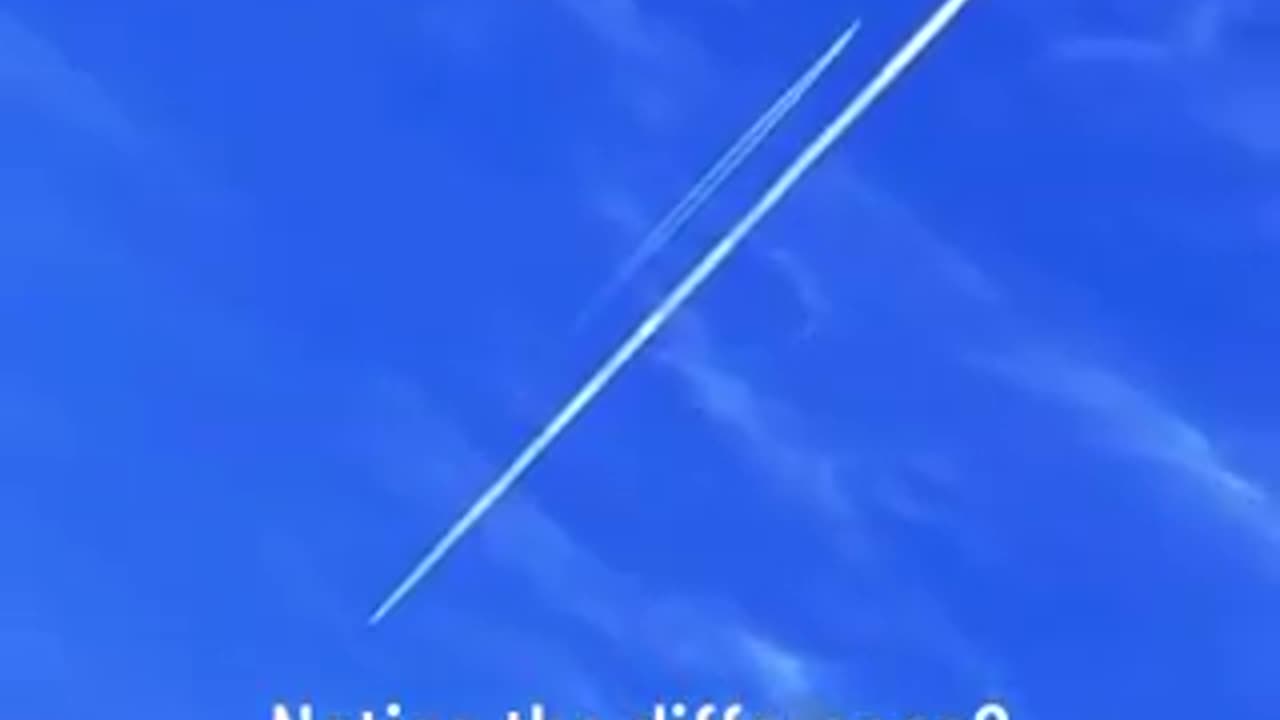 A contrail and a chemtrail at the same time...