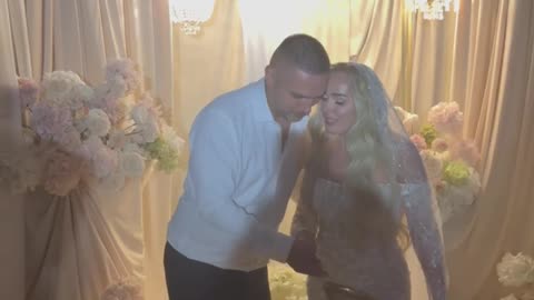 Groom Pushes Cake Off the Table