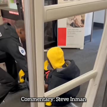 Security guard sweeps the leg of a White Claw thief