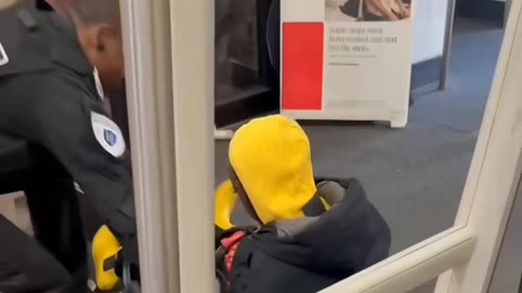 Security guard sweeps the leg of a White Claw thief