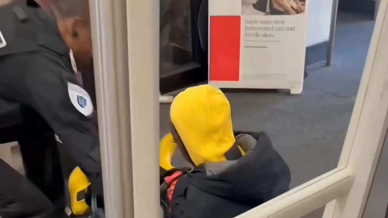 Security guard sweeps the leg of a White Claw thief