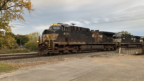 Norfolk Southern engines 4171, 4556, and 3353 head East