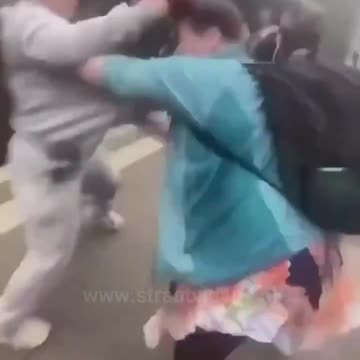 White woman with child attacked by savage third world