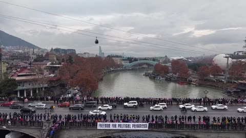 Hundreds of thousands of pro-EU protesters formed “human chains” in cities across Georgia