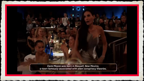 LOOK WHAT THEY PUT ON THE SCREEN AS DEMI MOORE WON AWARD FOR BEING A WITCH ADDICTED TO RED SERUM!