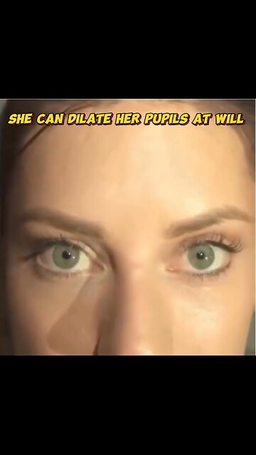 She can dilate her pupils at will