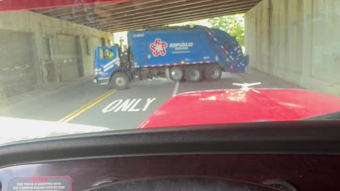 Garbage Truck Stuck in a Tunnel