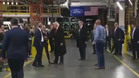 President Trump greeted with applause as he tours the Dearborn Michigan Ford Truck Plant