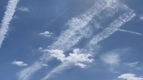 Those clouds look funny, almost like if …. they aren’t natural
