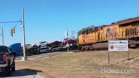An 18-wheeler transporting cars in Schertz, Texas gets hit by a train