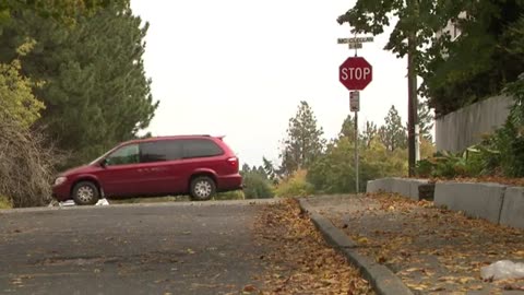 Man shot and killed inside car on Spokane's lower South Hill, police searching for suspect