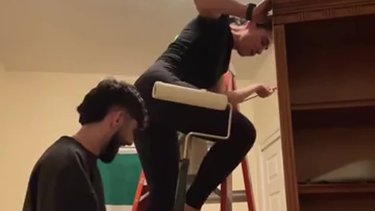 Tickling girlfriend feet on ladder