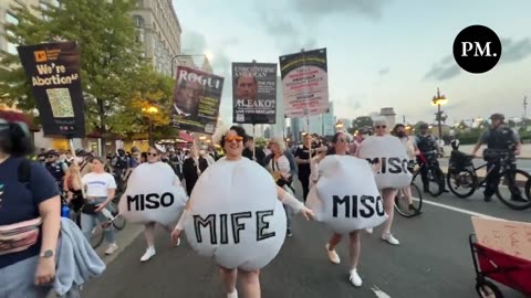 DNC protesters are dressed up as abortion pills.