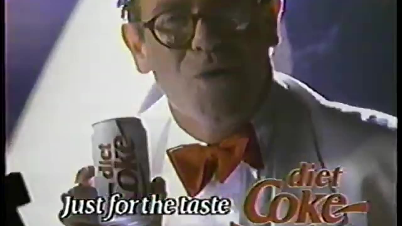Elton John in 1991 Diet Coke Ad